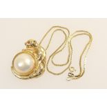 14ct gold baroque pearl and diamond leopard pendant, suspended from a 9ct gold box link necklace,