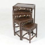 Oriental quartetto nest of carved wood occasional tables,