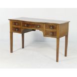 Edwardian mahogany serpentine front dressing table, circa 1910,