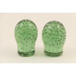 Two Nailsea glass dumps, 19th Century, each of loose balloon shape,