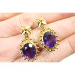 Pair of 9ct gold and amethyst pendant earrings, oval cut amethyst 11mm x 9mm,