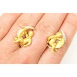 Pair of 18ct gold diamond cherub moon earrings,