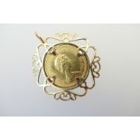 Queen Elizabeth II sovereign, 1980, within a 9ct gold openwork pendant mount, gross weight approx.