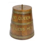 Brass mounted oak rum barrel, lidded tapered coopered form with brass finial,