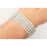 Diamond and cultured pearl bracelet in 18ct white gold,