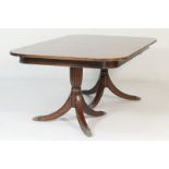Regency style mahogany twin pedestal dining table,
