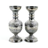 Matched pair of Egyptian 900 standard silver vases,