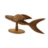 Christie Warren (Contemporary, Pitcairn Islands), Carved wooden flying fish, original stand,