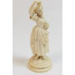 French carved ivory figure of a grape picker, circa 1870,