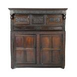 Oak joined press cupboard, dated 1691, with later restorations,