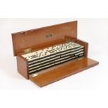 Jaques and Son, London, near complete set of bone and ebony nine spot dominoes,