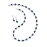 Attractive diamond and sapphire riviere suite comprising a necklace set with 29 oval cut sapphires,