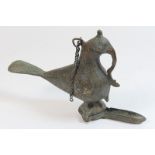 Indian cast brass oil lamp, 19th Century, taking the form of a bird,