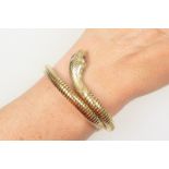 9ct gold and steel cored serpent bracelet, circa 1973,