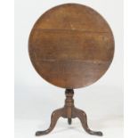 Late Georgian oak pedestal tripod table,