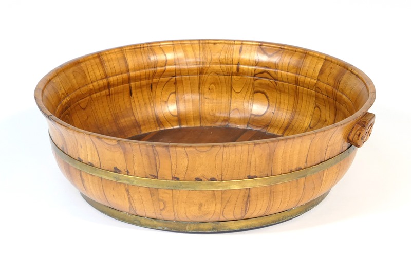 Chinese elm and brass banded bowl, with carved ruyi lappet handles, 49.