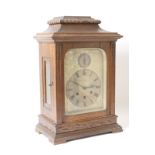 German oak cased chiming bracket clock, retailed by Schierwater & Lloyd, Liverpool,