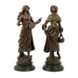 Pair of French bronzed spelter figures by L & F Moreau (19th/20th Century),