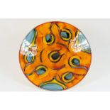 Poole Pottery 'Peacock' charger, decorated in bright orange and sea green colours, 41cm diameter,