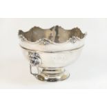 George V silver rose bowl by William Hutton and Sons, Birmingham 1910, having a border of masks,