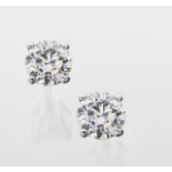 Pair of diamond ear studs by Boodle and Dunthorne, the brilliant cut stones totalling approx. 2.