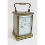 French brass repeating carriage clock, white enamelled dial with Roman numerals,