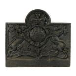 Cast iron fire back in the Charles II style, cast with the royal crest centred with a date '1664',