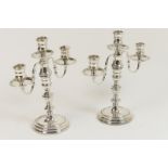 Pair of modern silver candelabra, London 1977,