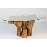 Designer yewood and plate glass dining table, the oval top 211cm x 139cm,