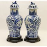 Pair of Chinese blue and white lidded vases, late 19th or 20th Century,