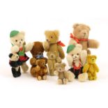 Small collection of Schuco and other miniature teddy bears, including gold plush nodding head bear,