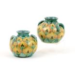 Pair of Della Robbia Pompeian vases, circa 1903, shape no.