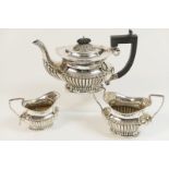 Edwardian silver bachelor's three piece tea service, Birmingham 1903, comprising teapot,