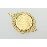 George V sovereign, 1915 (VF), clip mounted in a 9ct gold scrollwork pendant mount, 47mm x 30mm,