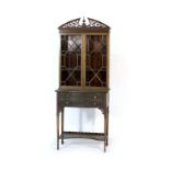 Late Victorian mahogany display cabinet on stand in the Chippendale style,
