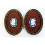 Two framed jasperware cameos by James Hadley, featuring King Edward VII and Queen Alexandra,