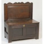 Oak joined box settle, made up from 18th Century and later elements,