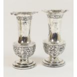 Matched pair of silver vases, one Birmingham 1898, the other with indistinct London marks,