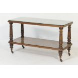 Victorian mahogany two tier buffet, having rectangular shelves with a moulded edge,