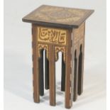 Islamic inlaid jardiniere stand, the square top inlaid with boxwood and mother of pearl calligraphy,