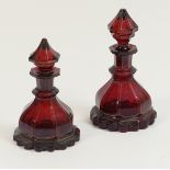 Two similar Bohemian ruby glass scent bottles and stoppers, circa 1870,