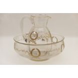 Unusual glass toilet set, circa 1900, comprising ovoid jug and wash bowl,