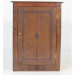 Oak and mahogany banded flat front hanging corner cupboard, early 19th Century,