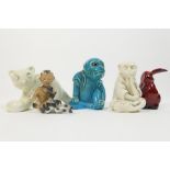 Small group of five pottery figures including a Royal Doulton flambe rabbit,