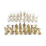 Modern silver gilt and silver chess set, London 1996, featuring figures from Greek mythology,