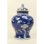 Chinese blue and white prunus vase and cover, late 19th Century, wide baluster form,