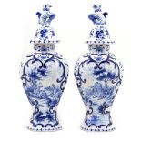 Pair of Dutch delft lidded vases in 18th Century style,