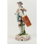 Samson of Paris porcelain figure of an 18th Century drummer, decorated in colours and gilt,