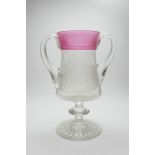Victorian glass loving cup, having reeded cranberry bands to the neck,