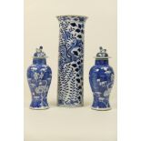 Chinese blue and white sleeve vase, late 19th Century, decorated with dragons amidst prunus,